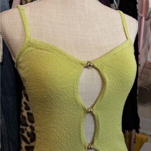 Vibrant Green Knit Top with Cutout Details gold accents